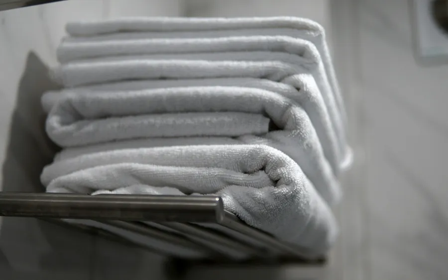 Folded towels on a rail