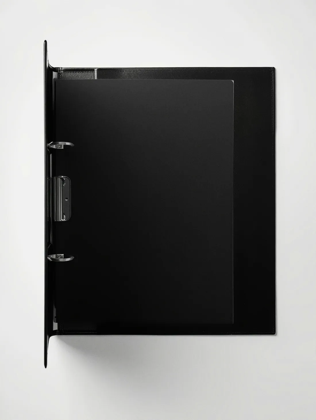 A black ring binder, open